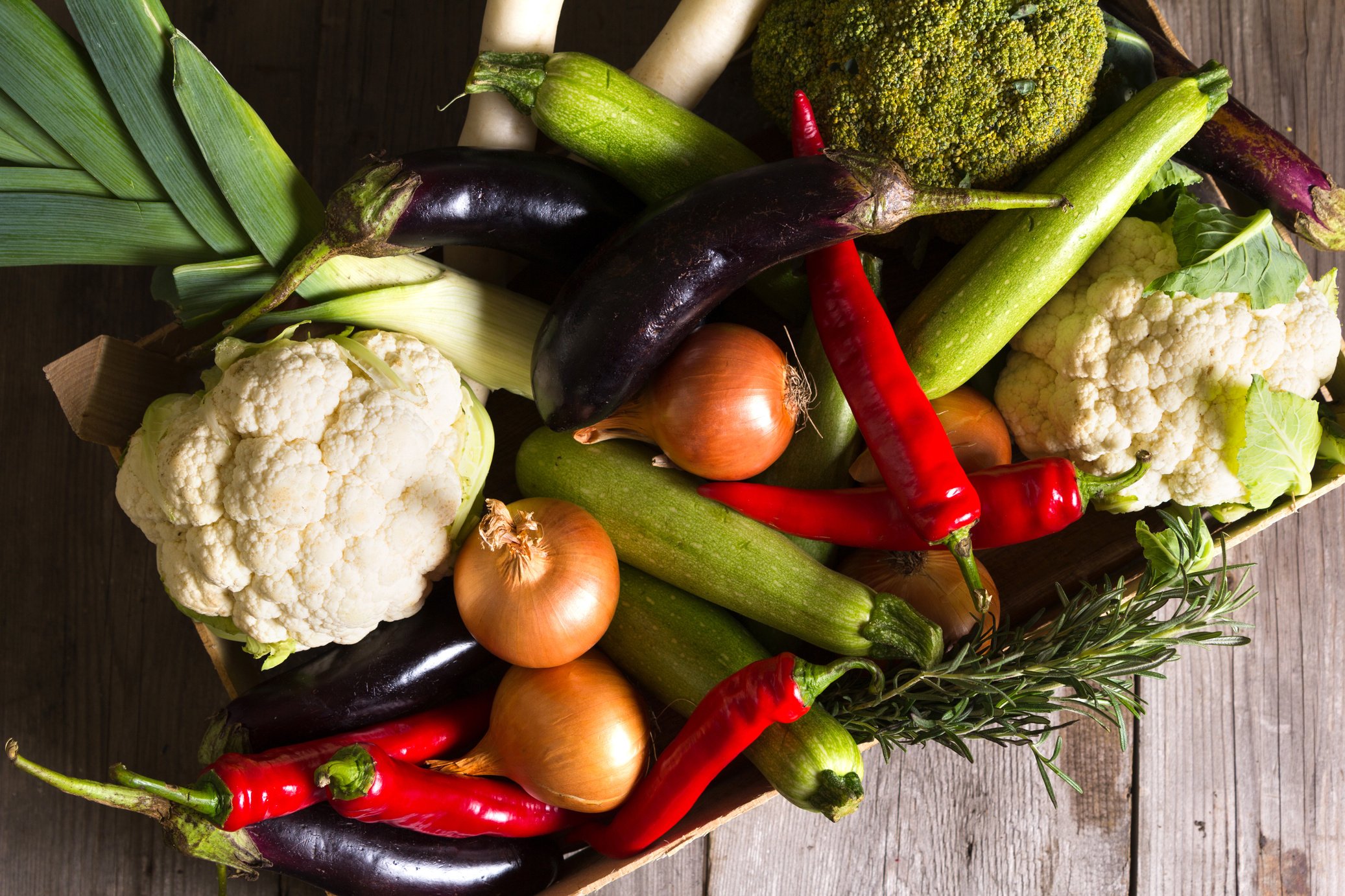 Different kind of local vegitables on the wooden rustic table